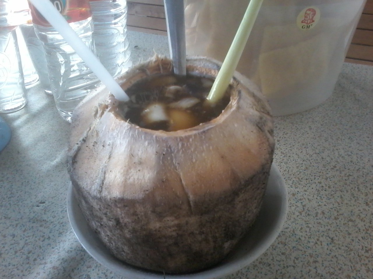 Nikmatnya Kelapa Bakar Rempah Bang Is