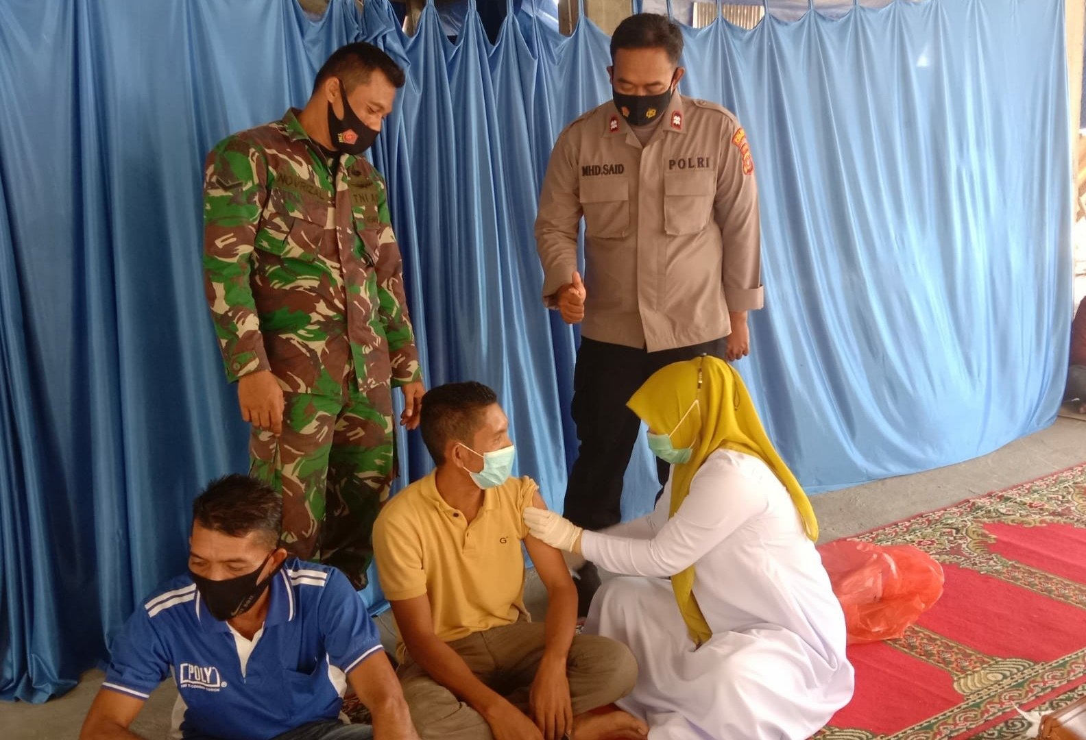 Vaksinasi di wilkum Polres Lhoks