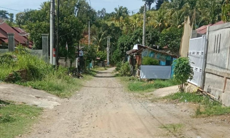 Masyarakat Minta Pemko Lhokseumawe Bangun Parit dan Aspal Jalan Utama Poroh Permai