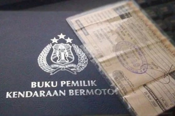 Ilustrasi Buku pemilik kendaraan dan STNK
